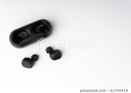 Wireless earbuds or earphones on white background 62350419