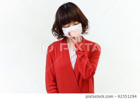 woman wearing a mask woman wearing a mask 62351294