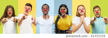Portrait of young people celebrating red nose day on colorful background 62355256