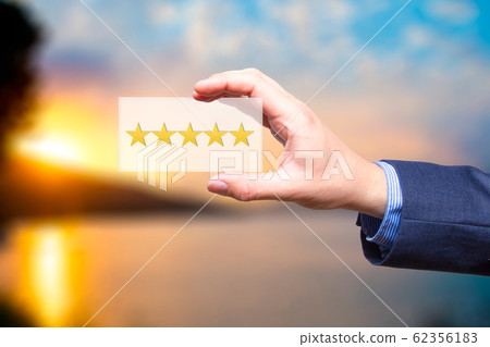 Businessman holding a concept of the increase and Businessman holding a concept of the increase and 62356183