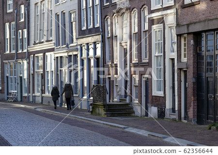 Street with historical buildings in Dordrecht Street with historical buildings in Dordrecht 62356644