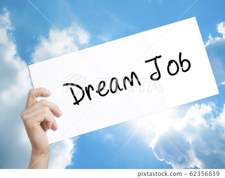 Dream Job Sign on white paper. Man Hand Holding Dream Job Sign on white paper. Man Hand Holding 62356839
