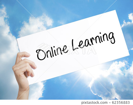 Online Learning Sign on white paper. Man Hand 62356883