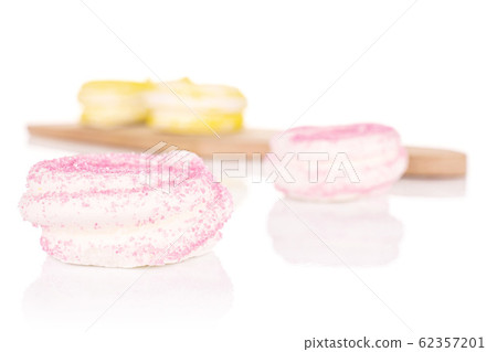 Sweet pastel meringue isolated on white Sweet pastel meringue isolated on white 62357201