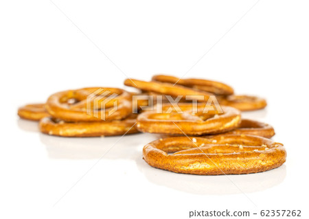 Salty brown pretzel isolated on white Salty brown pretzel isolated on white 62357262