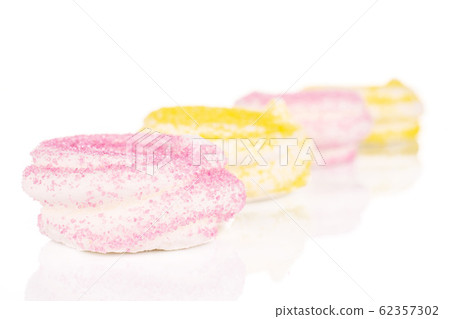 Sweet pastel meringue isolated on white Sweet pastel meringue isolated on white 62357302
