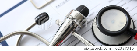 Medical instruments lying at patient history list 62357319