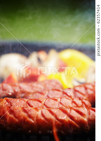 Grilling Sausages on barbecue grill 62357414