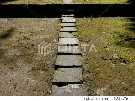 In the grounds of a straight stepping stone temple 62357563