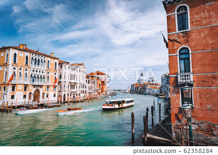 Grand Canal. Basilica Santa Maria della Salute in background, Venice, Italy Grand Canal. Basilica Santa Maria della Salute in background, Venice, Italy 62358284