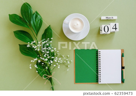 Wooden cubes calendar March 4. Open blank notepad, 62359473