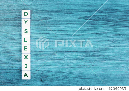 Dyslexia concept, word on blue desk 62360085