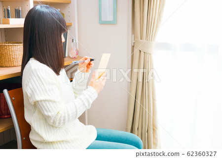 Women filling in envelopes Address Writing style Manners Women filling in envelopes Address Writing style Manners 62360327