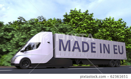 Modern electric semi-trailer truck with MADE IN EU text on the side. European Union import or export related 3D rendering Modern electric semi-trailer truck with MADE IN EU text on the side. European Union import or export related 3D rendering 62361651