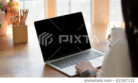 Close-up view of girl working on her project while Close-up view of girl working on her project while 62367132