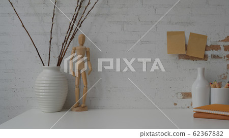 Close up view of contemporary workspace on white 62367882