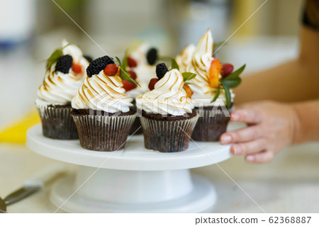 Plate with freshly baked sweet muffins. Sweet 62368887