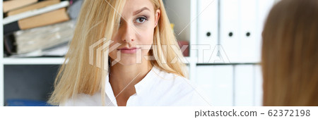 Young couple trying to get loan at bank clerk consultant 62372198