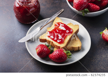 Toasts with strawberry jam 62374235