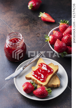 Toasts with strawberry jam 62374236