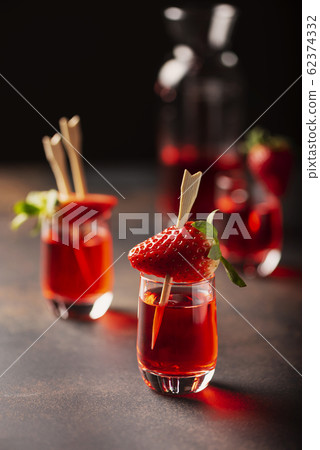 Shot with strawberry vodka 62374332
