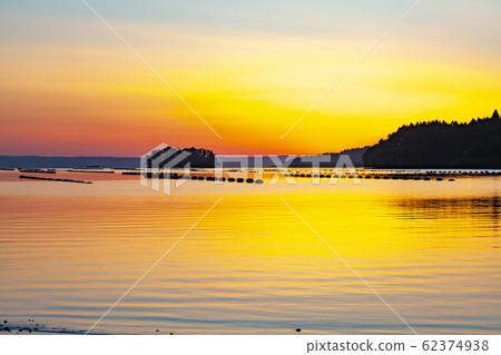 Scenery of the sunrise greeted by Noto Island, Nanao City, Ishikawa Prefecture 62374938
