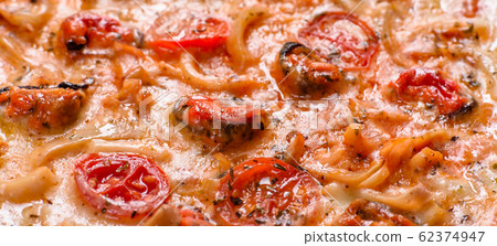 Tasty sliced pizza with seafood and tomato 62374947