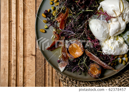 Salad with burrata cheese 62378457