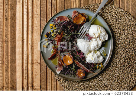 Salad with burrata cheese 62378458
