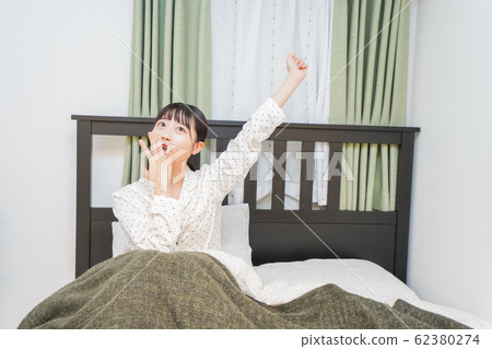 Young woman relaxing 62380274