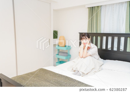 Young woman relaxing Young woman relaxing 62380287