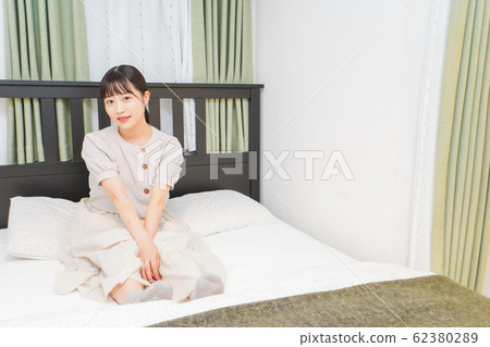 Young woman relaxing 62380289