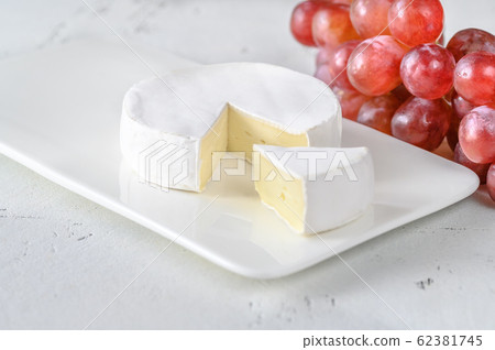 Camembert on the serving plate Camembert on the serving plate 62381745
