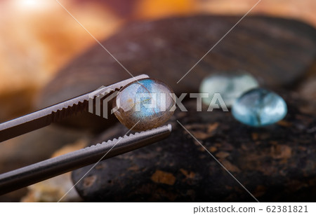 Round cut labradorite mineral gemstones. Round cut labradorite mineral gemstones. 62381821