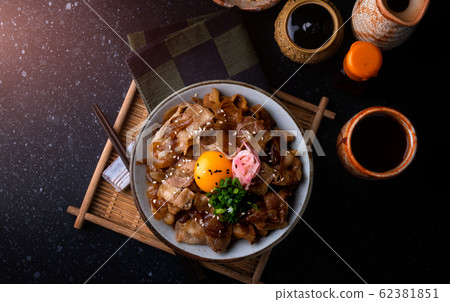 Japanese style rice with simmer pork. Japanese style rice with simmer pork. 62381851