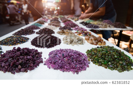 Mineral gemstones in jewelry market. Mineral gemstones in jewelry market. 62381852