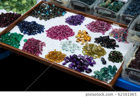 Mineral gemstones in jewelry market. Mineral gemstones in jewelry market. 62381865