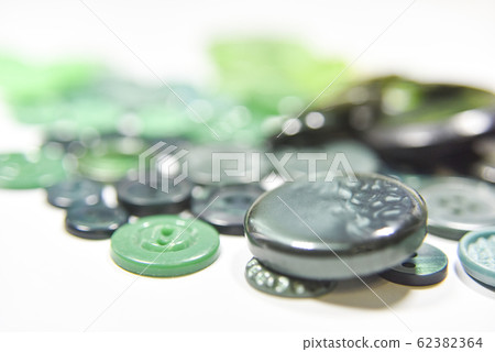 Green buttons of different shape and size on the Green buttons of different shape and size on the 62382364