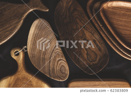 Set of cutting boards on wooden background Set of cutting boards on wooden background 62383809