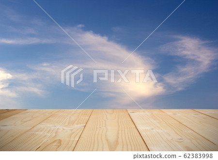 Blue sky background with wooden planks Blue sky background with wooden planks 62383998