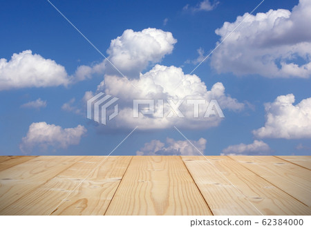 Blue sky background with wooden planks Blue sky background with wooden planks 62384000