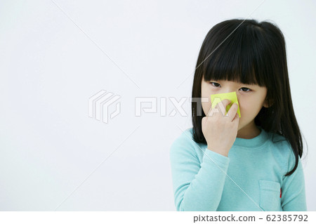 Notepad A girl with sticky notes on her face Notepad A girl with sticky notes on her face 62385792