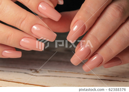 Fashionable design of manicure on beautiful girls 62388376