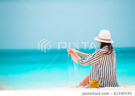 Young beautiful woman on beach vacation on Caribs 62390545