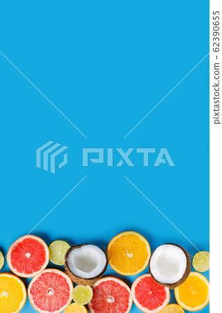 Summertime tropical background with exotic fruits 62390655