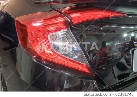 Detail on the rear light of a black. black sport Detail on the rear light of a black. black sport 62391743