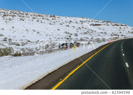 Truck trailer transports cars on highway with Truck trailer transports cars on highway with 62394599