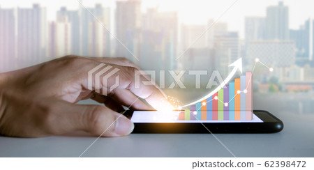 Business analyze graphs with the technology development pointing graph corporate to success and growing plan concept 62398472