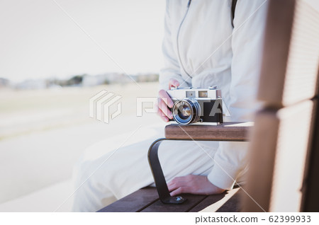Woman go out camera Woman go out camera 62399933
