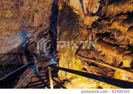 Tourists in Dikteo Andro Cave also known as birth place of Zeus in Crete Tourists in Dikteo Andro Cave also known as birth place of Zeus in Crete 62400303